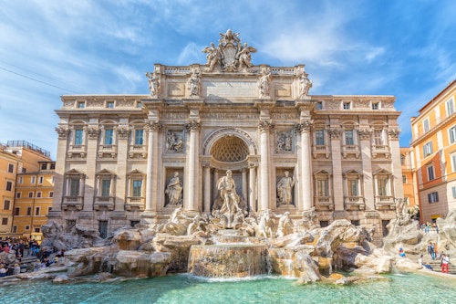 Toss a coin into the Trevi fountain, Rome, Shutterstock