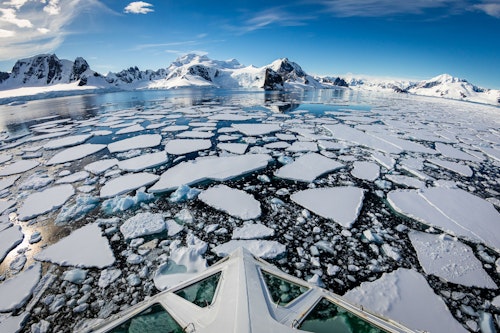 Bow of ship in icy waters, Antarctica, Grant Thomas