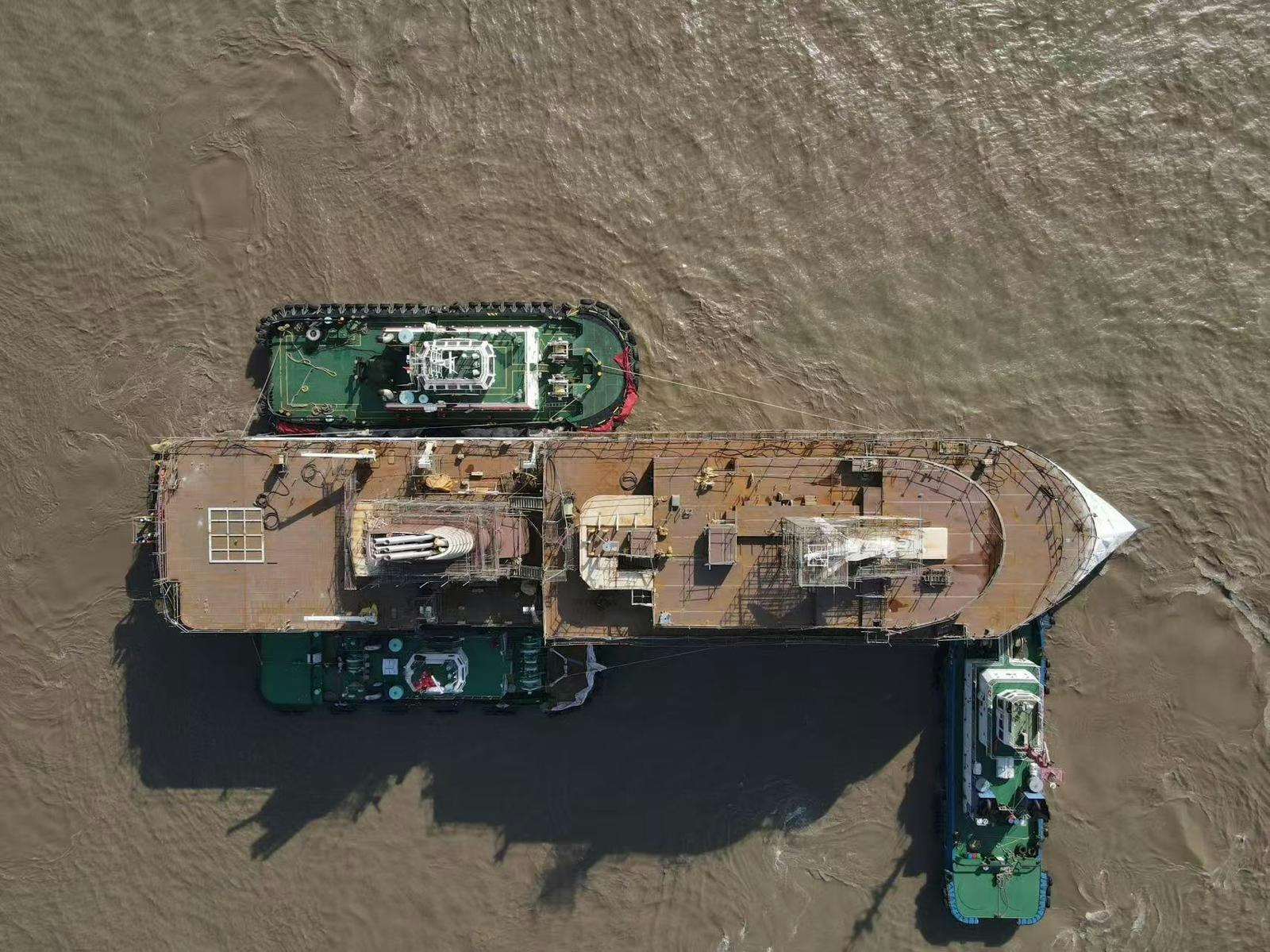 Douglas Mawson launches from the build dock — a major construction milestone.